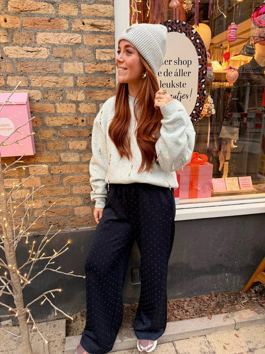 Lichtgrijze sweater met gekleurde kralen franjes