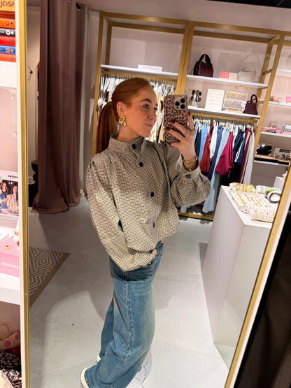 Check blouse buttons