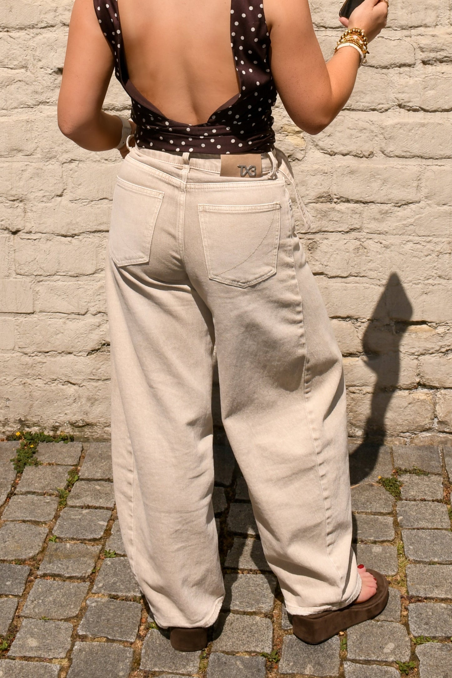 Open rug polkadot top