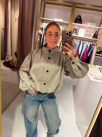 Check blouse buttons