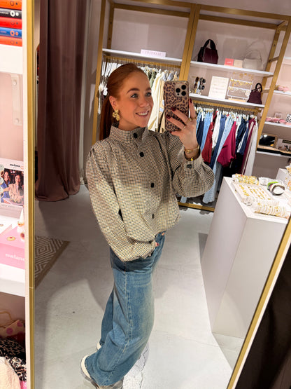 Check blouse buttons